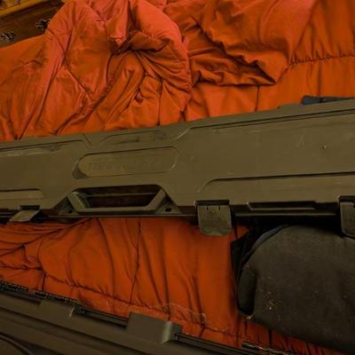 This is a durable, hard-shell plastic gun case by Flambeau, designed to protect a rifle or shotgun. With its sturdy construction and...