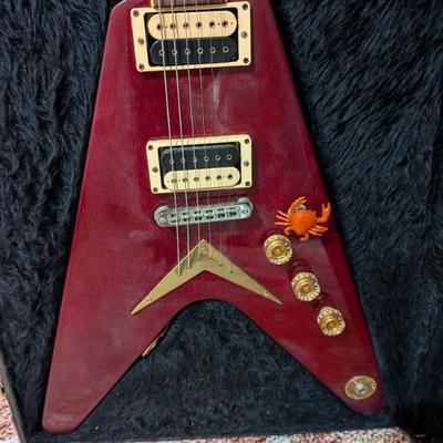 A classic electric guitar for any rock or metal fan! This is an iconic V-shaped guitar by the well-known American manufacturer Dean. The...