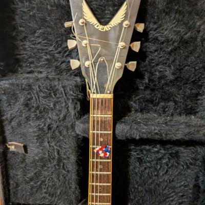 A classic electric guitar for any rock or metal fan! This is an iconic V-shaped guitar by the well-known American manufacturer Dean. The...