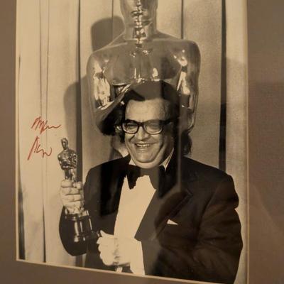 An exceptional piece of Hollywood history! This framed black-and-white photo captures the acclaimed actor Ray Milland with his Academy...