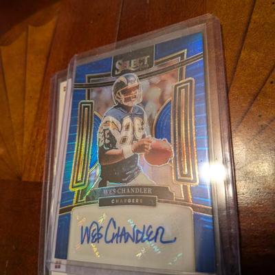 This is a rare, limited edition collectible featuring an authentic signature from former NFL player Wes Chandler. The card is from the...