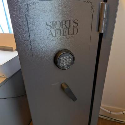  This is a fantastic opportunity to own a reliable and secure gun safe. This Sports Afield safe features a textured gray finish, a...