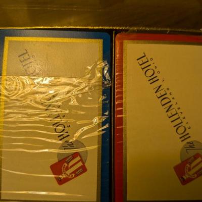 This is a rare and unique piece of history from a bygone era! This set includes two decks of still-sealed playing cards from the famous...