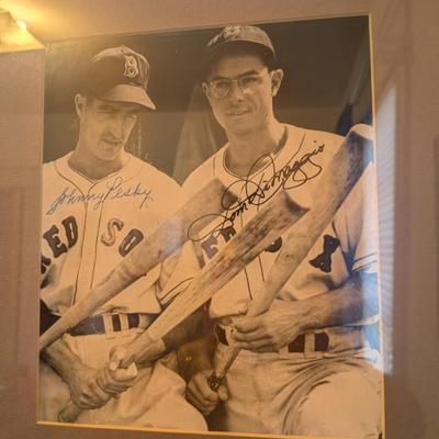 A truly special piece for any Boston Red Sox fan, this signed black-and-white photo captures two legends, Johnny Pesky and Dom DiMaggio....