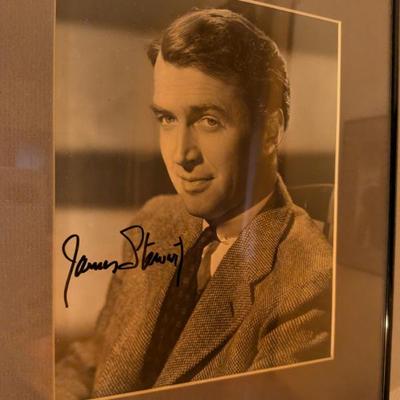 Framed photo with a signature that appears to be from James "Jimmy" Stewart, a beloved actor who starred in some of the most...