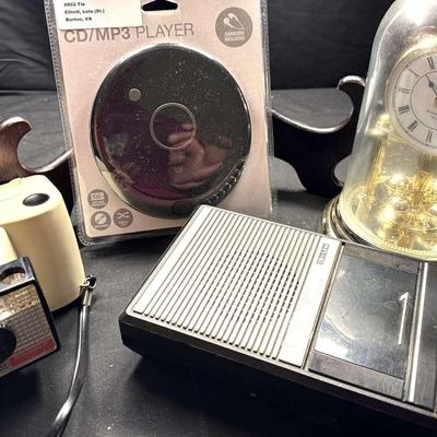 Lot 140:  CD/MP3 Player, Panasonic Tap Recorde, Polaroid Swinger Model 20, Clock