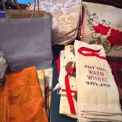 Lot 175:  Holiday Linens… Tablecloths, Napkins, Runners, Lace Doilies