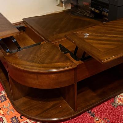 Lot 406: Wood Coffee Table with Lift-Top Panels and Storage