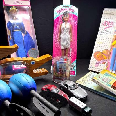 Lot 168:  Wooden Crocodile Bank, Dolls,Books, Slinky, Cars