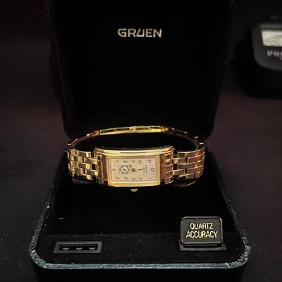 Lot 331: Gruen Curvex Quartz Dress Watch – Gold-Tone with Box