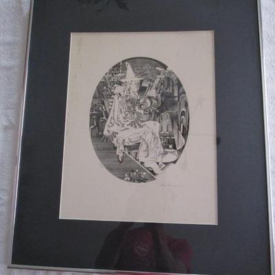Sale Photo Thumbnail #67: Signed print in black and white of a clown, framed and matted.  273 out of 400.