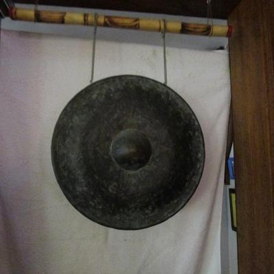 Sale Photo Thumbnail #56: Gong and mallet purchased in Myanmar (Burma).  Deep tone.  Shown mounted here on bamboo pole.