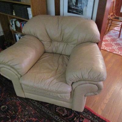 Overstuffed tan leather chair - very comfortable, no damage