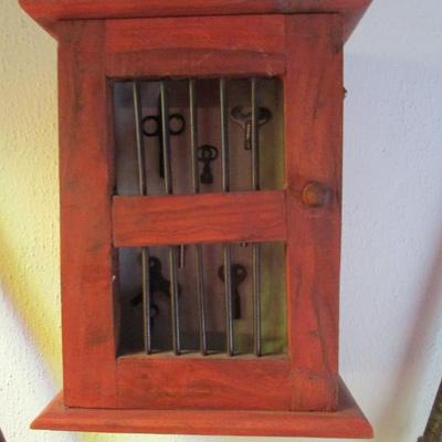 Sale Photo Thumbnail #82: Small wooden wall cabinet.