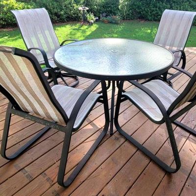 Black Metal Outdoor Dining Set with 4 Chairs & Round Glass Table