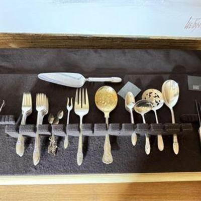 Lot 307   
Rogers Bros Silver Plated “First Love” Pattern Partial Silverware