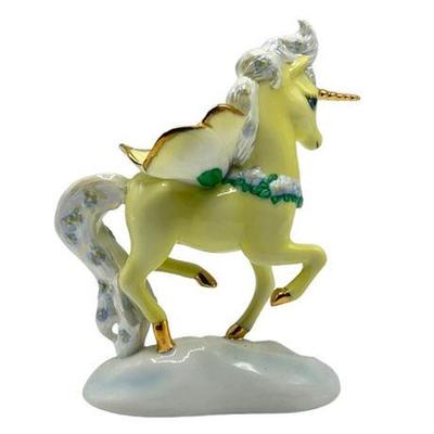 Lot 222   
Franklin Mint Collection, "Endless Love" Yellow Porcelain Unicorn