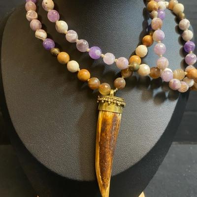 Buffalo Bone Horn Pendant On A Multi Beaded Strand