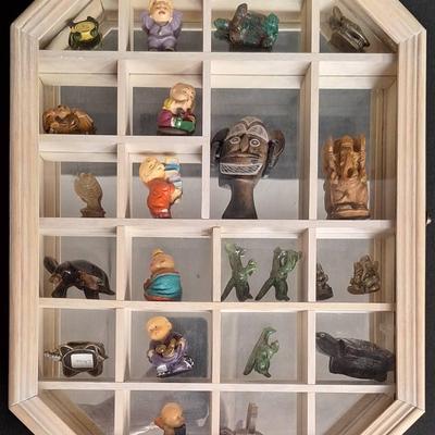 Shadowbox of Collectible Figurines