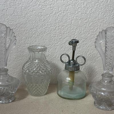 Vintage Perfume Bottles And A Vase