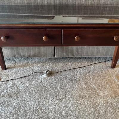 Vintage sofa table with protective glass top