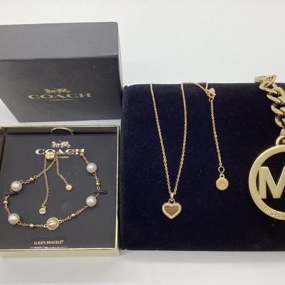 COACH Slider Bracelet, MICHAEL KORS Necklace, and Keychain