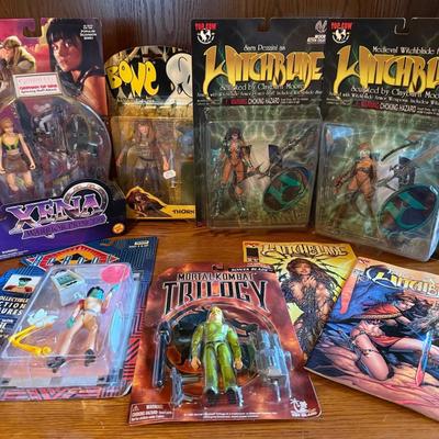 6 Action Figures Of Badass Women, Sealed, Plus 2 Comics