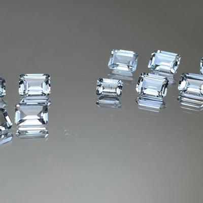 White Topaz & Swiss Blue Topaz-Emerald Cuts 11 Stones 6x4mm 13.65 CTTW