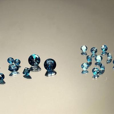 London Blue Topaz Rounds 4.45 CTTW 4mm and Topaz Suite of Mixed Shapes and Sizes 6.40 CTTW