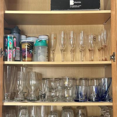 Cabinet Full Of Glassware - Flutes, Tumblers, Cups, Etc.