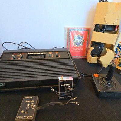 Atari 2600 Video Computer System with 13 Cartridges – Sold As-Is