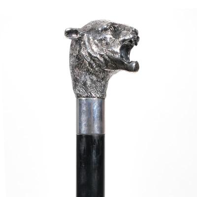 ANTIQUE ITALIAN STERLING JAGUAR HEAD FORM WALKING STICK | Designed as a jaguar's head with mouth open in sterling, mounted with a...