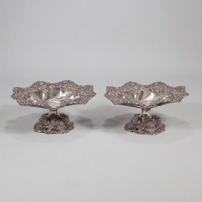 PAIR STERLING SILVER COMPOTES | Matching compotes with raised designs on pedestals and rims. Marked bottom of bowl inside pedestal. 50...