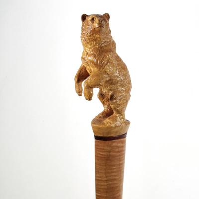 BLACK FOREST STYLE CARVED BEAR TIGER MAPLE STAFF | An impressive finely carved bear figure standing on his hind legs, joined to a highly...