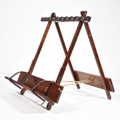 LEWIS DRAKE & ASSOCIATES FOLDING TRAVEL GUN RACK | Folding wood travel gun rack, applied stitched leather and leather straps, brass...