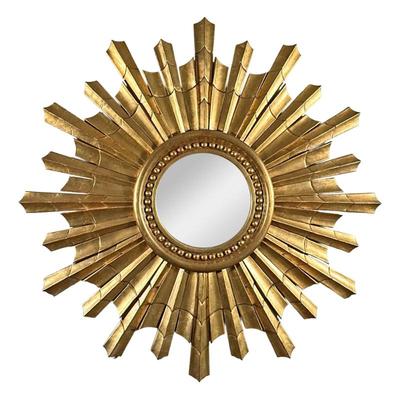 GILT CARVED SUNBURST MIRROR | Round mirror with gilt carve sunburst/ starburst frame
w. 46 x l. 46 in.
