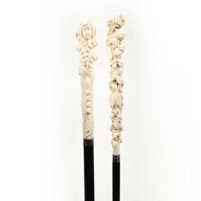 (2pc) TWO ANTIQUE CARVED BONE HANDLE WALKING STICKS |one with carved flowers & Sterling Silver Collar
Ebonized Shaft and a horn...