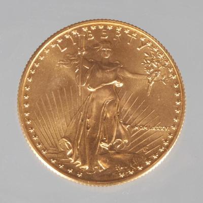 1986 $25 US GOLD COIN | 1986 American Eagle $25 gold coin, comprised of 1/2 oz fine gold coin, from the inaugural year with Roman...