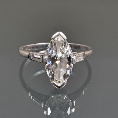 4CT MARQUIS CUT DIAMOND & PLATINUM ENGAGEMENT RING | *note: diamond color, clarity and millimeter measurements are all...
