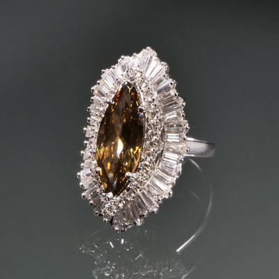 FANCY COGNAC BROWNISH YELLOW MARQUISE-CUT DIAMOND & PLATINUM RING / PENDANT | Convertible ring/pendant, center-set with a large...