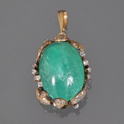 62 CARAT EMERALD CABOCHON & DIAMOND SET PENDANT | Designed as an enhancer pendant with a central ~62 carat (29 x 20.4 x 14.4 mm.,...