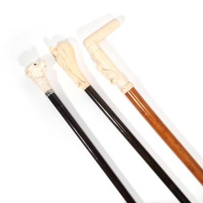 (3pc) ANTIQUE ENGLISH CARVED BONE HANDLED WALKING STICKS(3pc) ANTIQUE ENGLISH CARVED BONE HANDLED WALKING STICKS | Including, one carved...