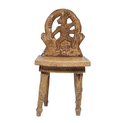 BLACK FOREST CHILD'S CHAIR | Hand carved wooden chair with bear carved on back.
h. 20 x w. 9.5 x d. 10 in. 
