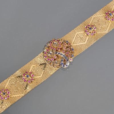 ITALIAN 18K GOLD CONVERTIBLE BROOCH BRACELET | Floral motif 18k yellow gold bracelet designed with four flower stations and a center,...