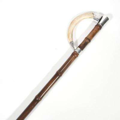 VICTORIAN STERLING SILVER & WILD BOAR TUSK WALKING STICK CIRCA 1890 | Sterling mark for London 1890Wild boar tusk with silver mounts...