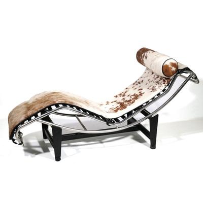 LE COURBOSIER LOUNGE CHAIR, HORSE HIDE | Having hide upholstered seat and cushion attached with elastic bands to a stainless steel frame,...