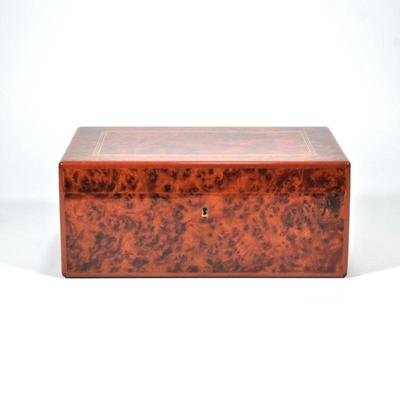 DUNHILL FRENCH BURLWOOD HUMIDOR | Polished beautiful burlwood finish, top with line inlay
h. 6 x w. 9 x l. 13.5 in.
