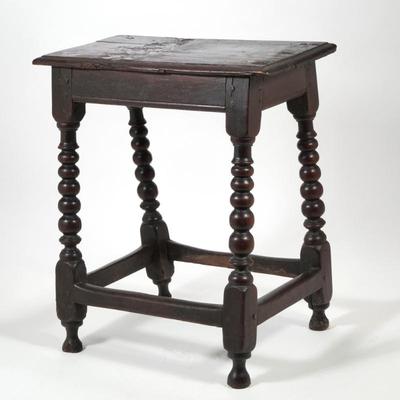 18TH CENTURY ENGLISH JOINT STOOL | Old single-board top, peg construction, sausage turnings, splayed legs joined by a box stretcher
h....