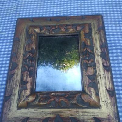 Carved wood mirror