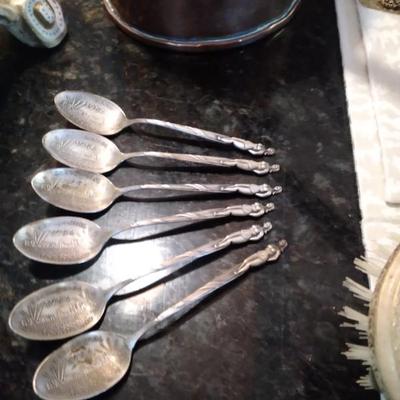 Figural sterling spoons